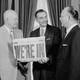 President Dwight D. Eisenhower and Secretary of the Interior Fred A. Seaton with Michael A. Stepovich, Territorial Governor of Alaska, holding up the front page of the Anchorage Daily Times bearing the headline in large block letters "WE'RE IN"