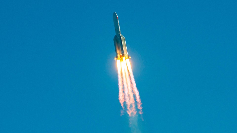 A Long March 5B rocket lifts off from a launch site in China