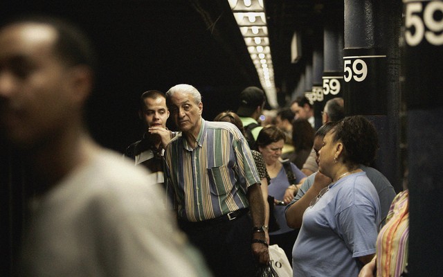 A crowded New York subway station.