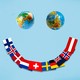 An illustration of a smiley face, with two globes as the eyes and a spread of countries' flags as the mouth