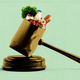 A gavel rests on a gavel block; the gavel’s mallet is a paper grocery bag full to the brim.