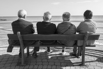 A group of friends sitting on a bench