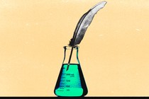 A beaker with a feather pen in it.