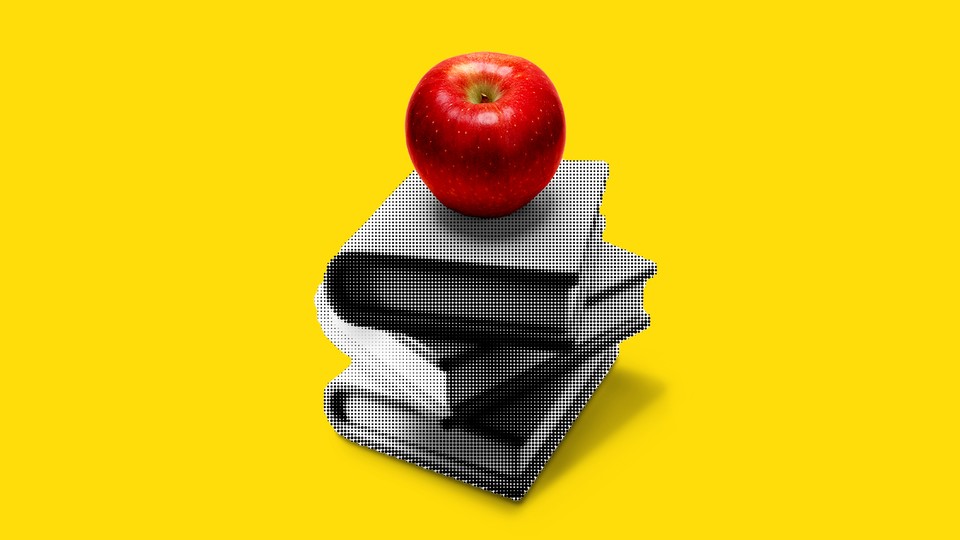 A red apple kept on top of pixelated books