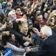 Young voters surrounding Bernie Sanders