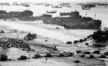 American military vehicles of all styles land at Omaha Beach, Normandy, in 1944