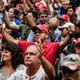 Congregation of evangelicals in church, some of them wearing MAGA caps