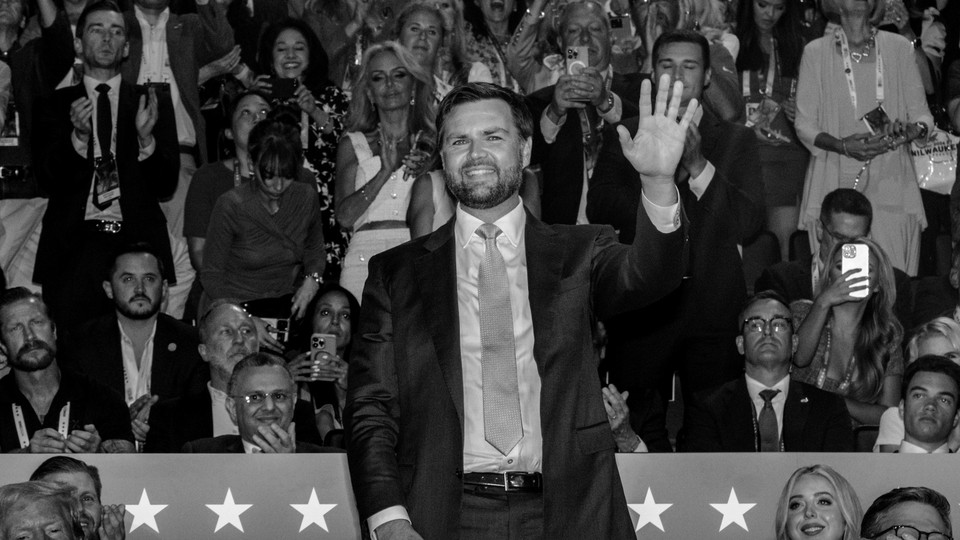 JD Vance waves to convention attendees hours after he was chosen as the Republican vice presidential candidate at the RNC on Monday night.