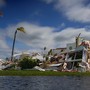 An image of a Florida waterside property ruined by Hurricane Ian