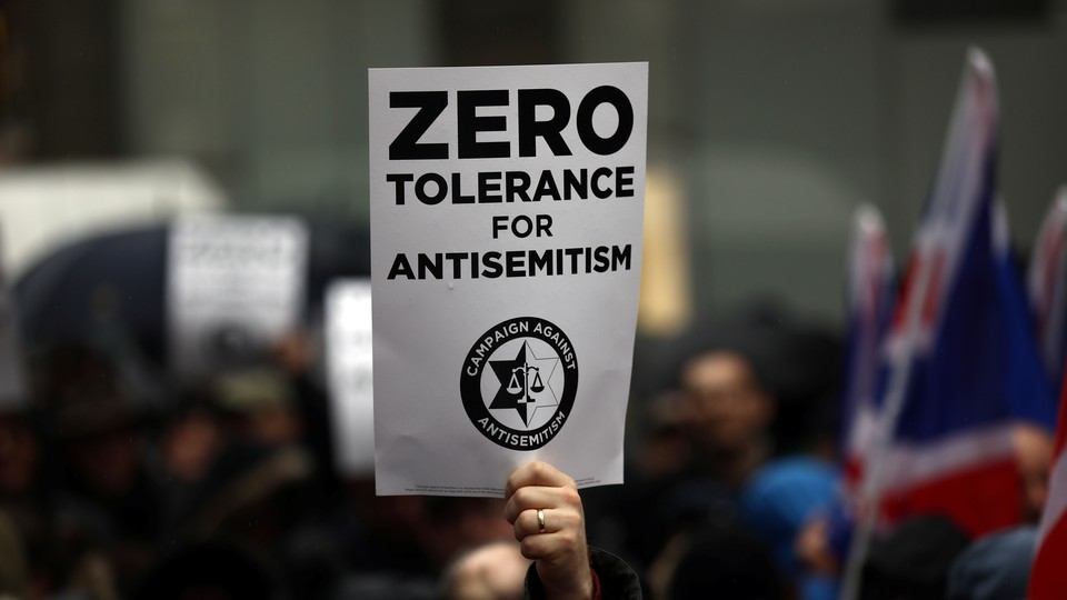 Demonstraters take part in an antisemitism protest outside the Labour Party headquarters in April, 2018