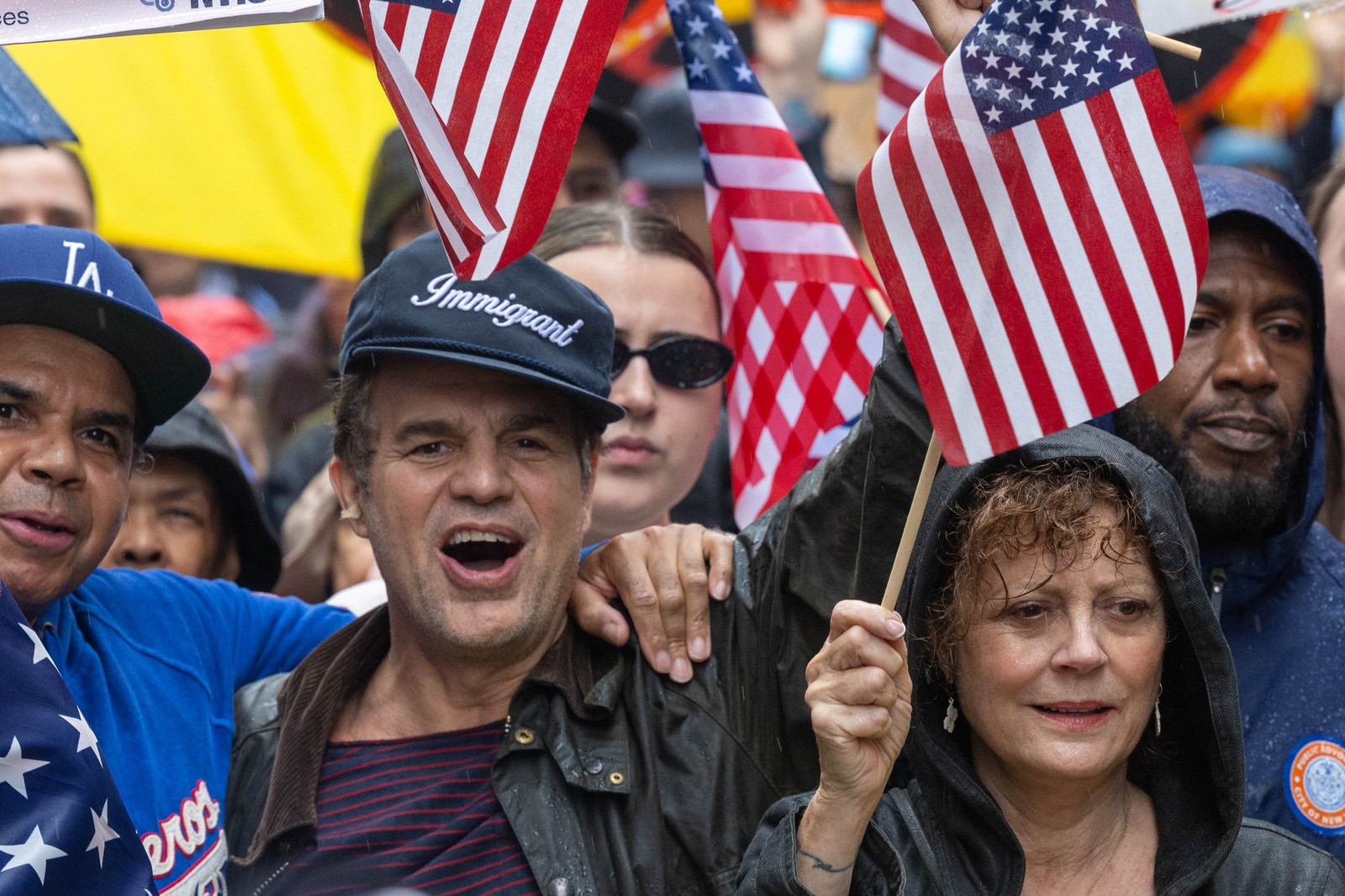 Performers Mark Ruffalo and Susan Sarandon join many others in a protest march.
