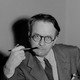 A black and white portrait of Raymond Chandler