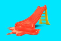 A graphic illustration of a red plastic play slide, with the bottom of it melting into a puddle.