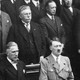 In a black-and-white photo, Nazis salute Hitler