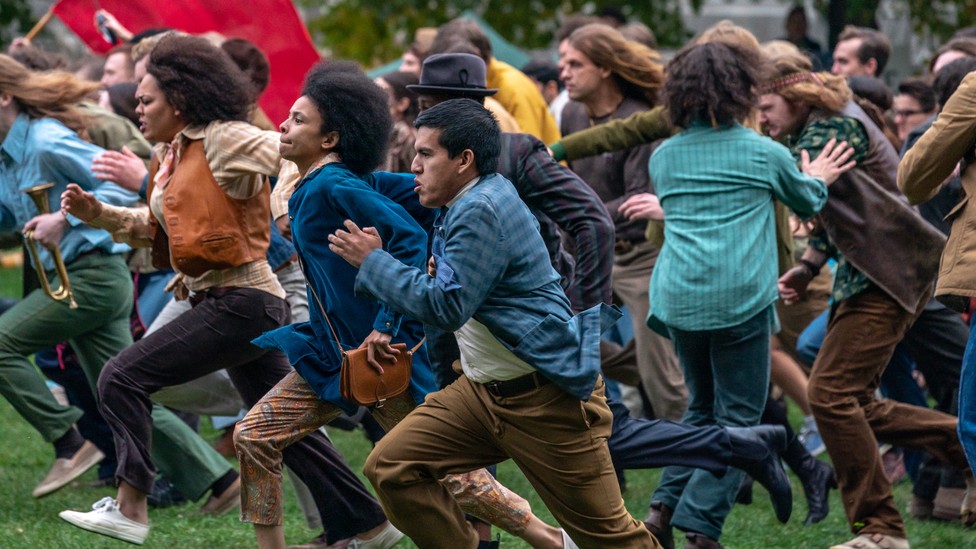 Protesters running
