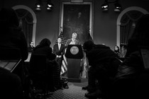 Bill de Blasio speaking from a podium