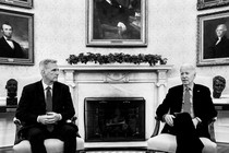 A black-and-white photo of Kevin McCarthy and Joe Biden sitting side by side