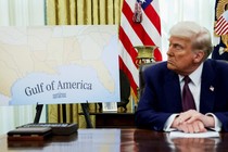 Photo of Donald Trump looking at a map of the “Gulf of America”
