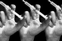 A black-and-white photo graphic of three repeating hands each holding up a syringe