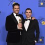 James Franco and Dave Franco pose after the former wins the Golden Globe for Best Actor in a Drama for 'The Disaster Artist'