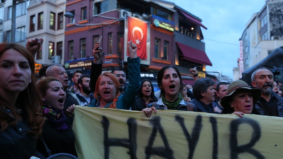 Anti-government demonstrators shout slogans during a protest in the Besiktas district of Istanbul, Turkey, on April 19, 2017. 