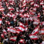Demonstrators wave Lebanese national flags