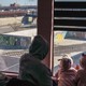 Migrants from Venezuela, who had their asylum appointments with U.S. officials cancelled hours after President Donald Trump's inauguration, look out at the closed border with the U.S. from a government-run shelter in Juarez, Mexico, on January 21.