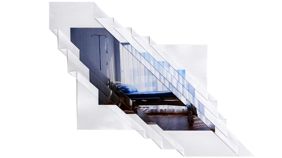 A distorted image of an empty hospital bed