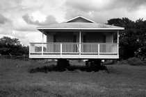 A foreclosed house stands vacant and boarded up in Fort Myers, Florida, in this photo taken during the 2008 recession