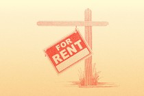 A "For Rent" sign hanging crookedly off a post