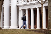 a student walks on campus