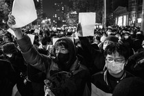 Black-and-white photo of protesters on the street in Beijing, China