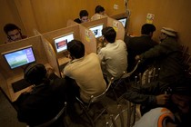 People in an internet cafe in Pakistan