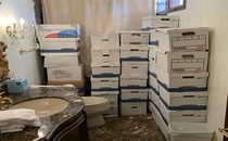 In a handout photo provided by the U.S. Department of Justice, stacks of boxes are seen in a bathroom and shower in the Mar-a-Lago Club’s Lake Room at former President Donald Trump’s estate in Palm Beach, Florida.