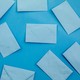 Multiple blue envelopes on a blue background