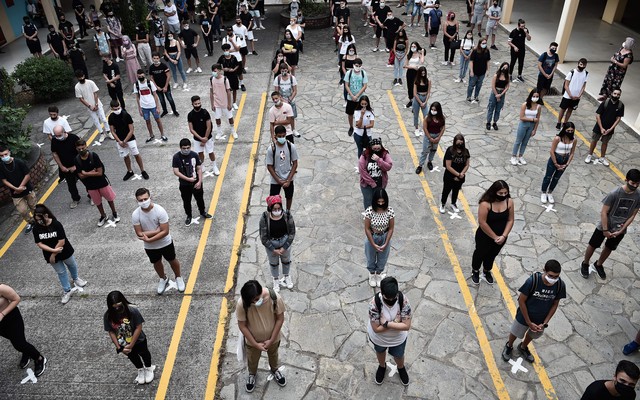 High-school students socially distance in Greece.