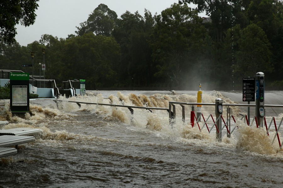 Floodwater overruns a dock area.