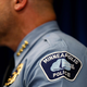 Uniformed officer with "Minneapolis Police" on his shoulder