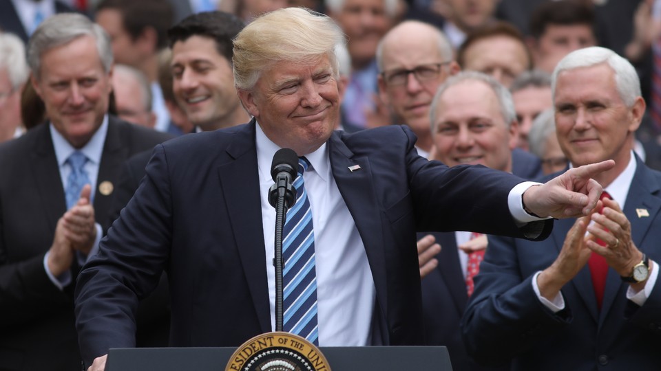 President Trump celebrates the House's passage of Obamacare repeal in May 2017.