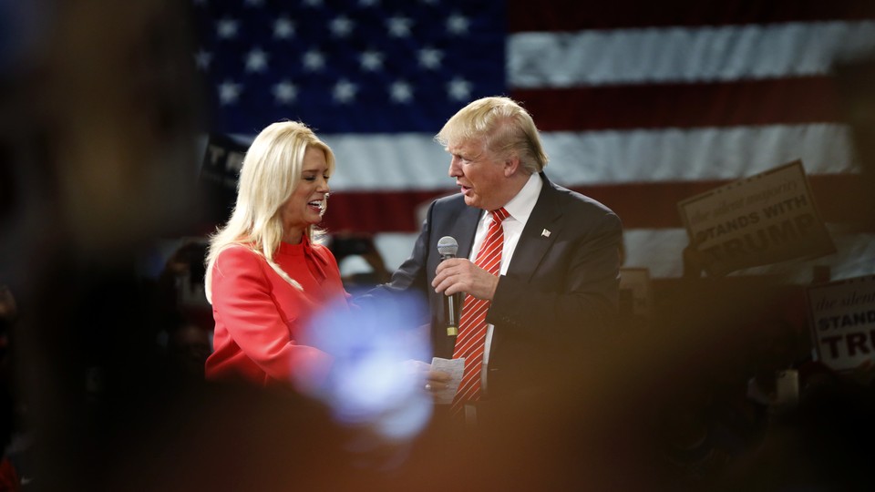 Donald Trump with Florida Attorney General Pam Bondi at a rally in Tampa, Florida, in March.