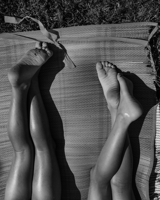 Legs tanning in sun 