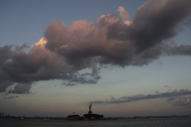 photograph of the skyline near the Statue of Liberty