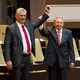 Newly elected Cuban President Miguel Diaz-Canel reacts as Raul Castro raises his hand during the National Assembly in Havana on April 19, 2018.