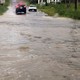 Two cars are blocked by floodwaters from Hurricane Irma in St. John's, Antigua and Barbuda.
