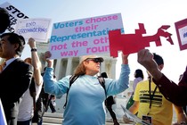 Demonstrators rally at the Supreme Court.