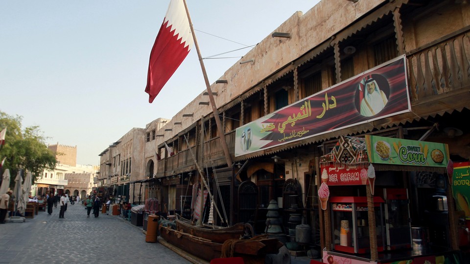 A shop with a picture of Qatar’s Emir Sheikh Tamim Bin Hamad Al-Thani is seen in Doha, Qatar, June 6, 2017.