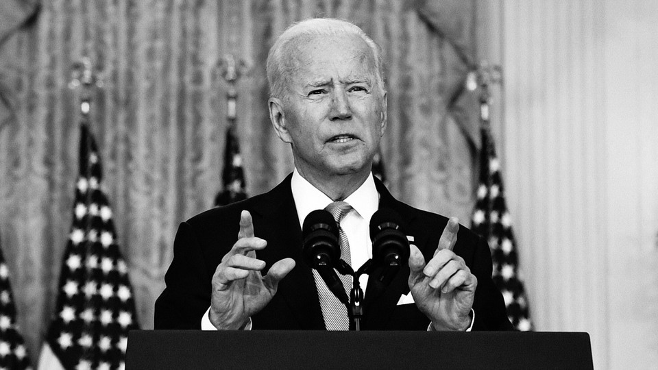 A black-and-white photo of Joe Biden as he delivers remarks about the situation in Afghanistan in the East Room of the White House
