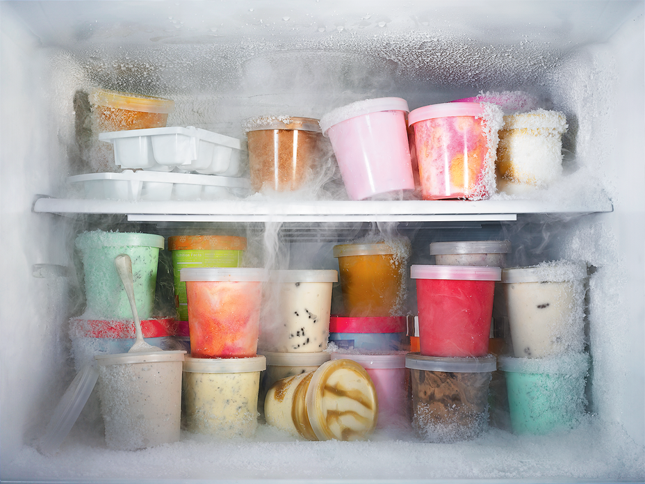 A photograph of a freezer filled with pints of ice cream.