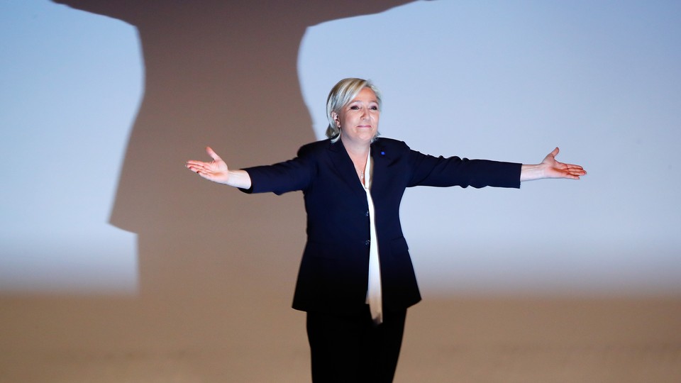 France's National Front leader Marine Le Pen gestures after a recent speech.
