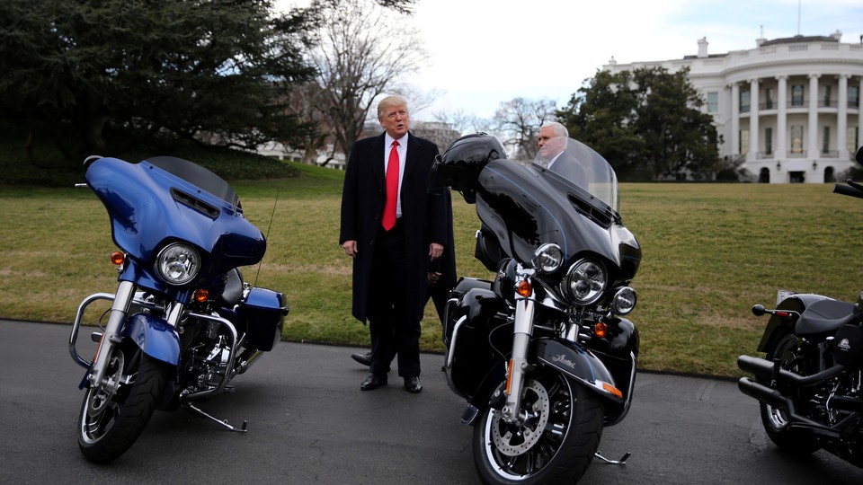 President Trump stands next to Harley Davidson motorcycles in Washington, D.C. on February 2, 2017.